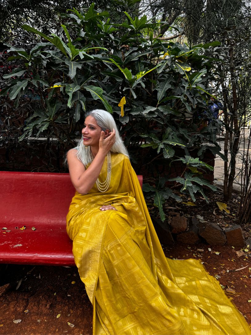 Yellow silk saree with zari border