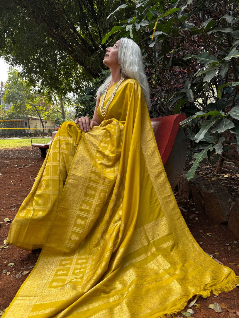 Yellow silk saree with zari border