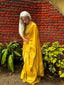 Yellow silk saree with zari border